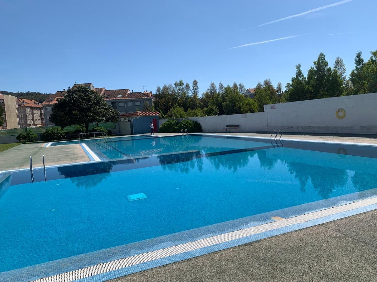 Urbanizacion Con Piscina Arnelas Санхенхо Экстерьер фото